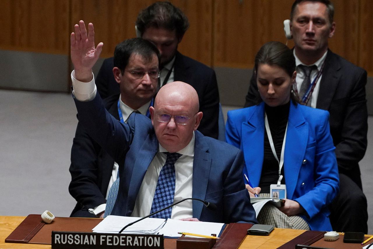 Members of the U.N. Security Council vote during a meeting on the conflict between Israel and Hamas