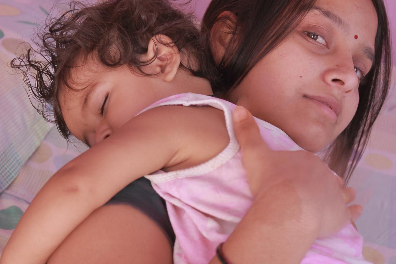 Young mother with her baby boy