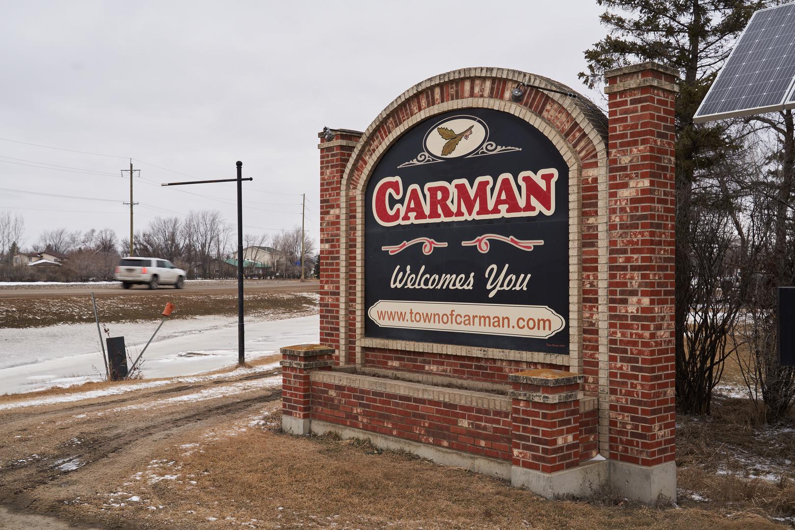 Carman, Manitoba sign. An ongoing investigation regarding five deaths in southern Manitoba continues, in Carman, Man., Monday, Feb. 12, 2024. THE CANADIAN PRESS/David Lipnowski