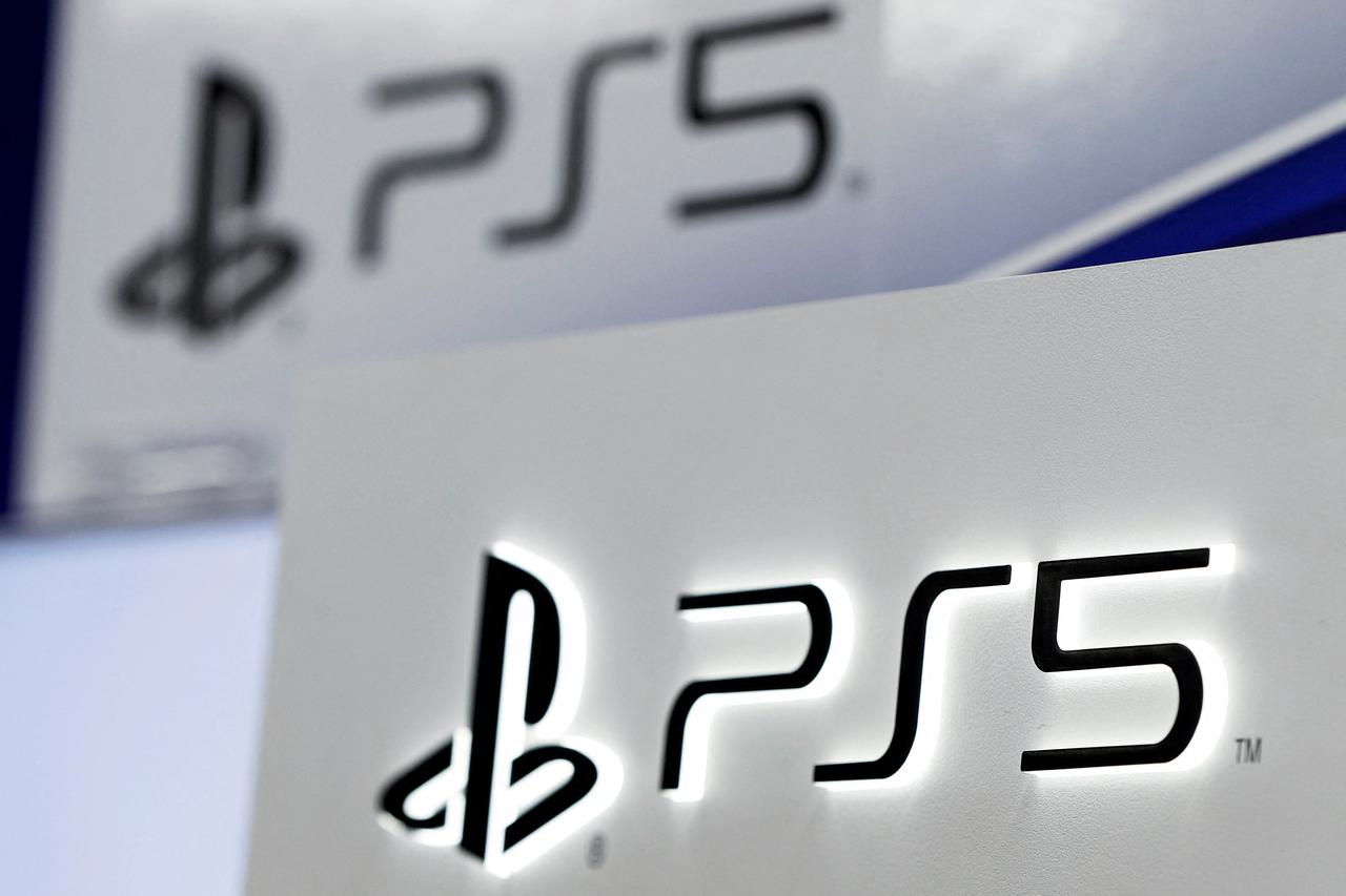 FILE PHOTO: The Sony PlayStation 5 logo is displayed at the consumer electronics retailer chain Bic Camera, ahead of its official launch, in Tokyo