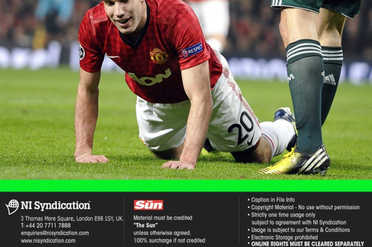 'Manchester United v Real Madrid, Champions League Last 16, 2nd leg. 5th March 2013. Manchester United's Robin Van Persie Credit: The Sun Online rights must be cleared by N.I.SyndicationPhoto: NI Syn