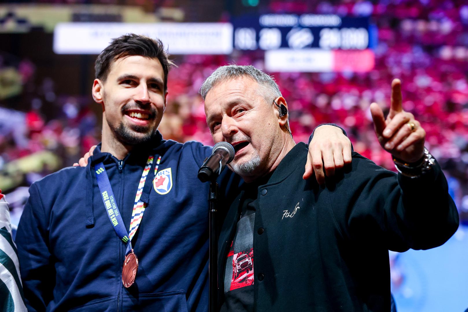 02.02.2026., Zagreb - Svecani docek hrvatske rukometne reprezentacije u na Trgu bana Josipa Jelacica nakon osvojene broncane medalje na Europskom rukometnom prvenstvu. Ivan Martinovic i Marko Perkovic Thompson Photo: Igor Kralj/PIXSELL