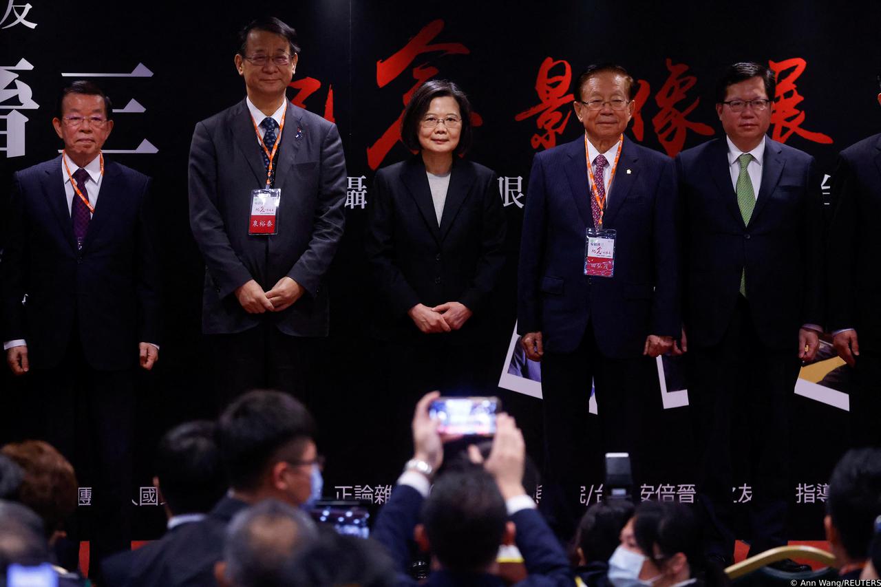 Taiwan President Tsai Ing-wen poses for a photo at an exhibition on late Japanese prime minister Shinzo Abe in Taipei