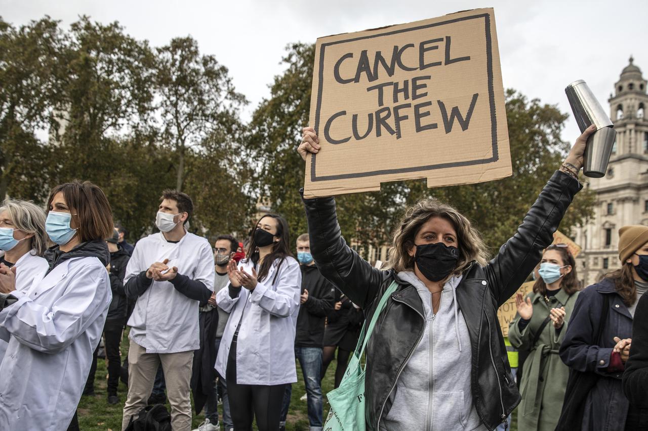 Members of the hospitality industry stage a noisy protest outside of Parliament