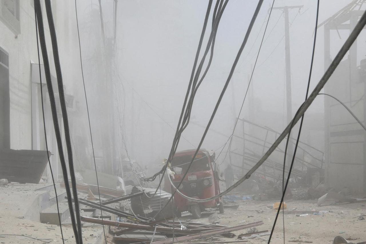 A general view shows the scene of an explosion near the education ministry building along K5 street in Mogadishu