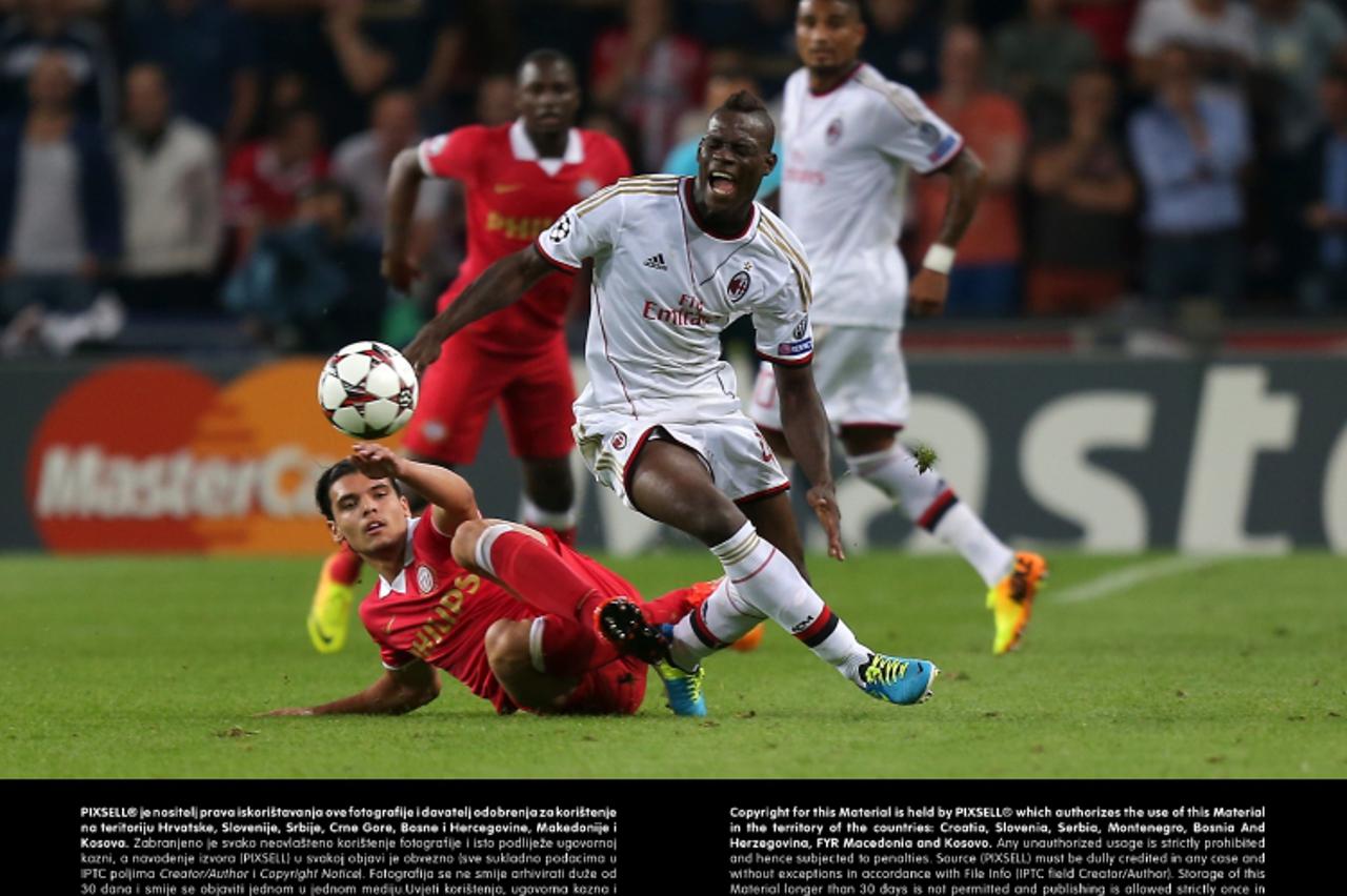 'PSV Eindhoven\'s Karim Rekik (left) tackles AC Milan\'s Mario BalotelliPhoto: Press Association/PIXSELL'