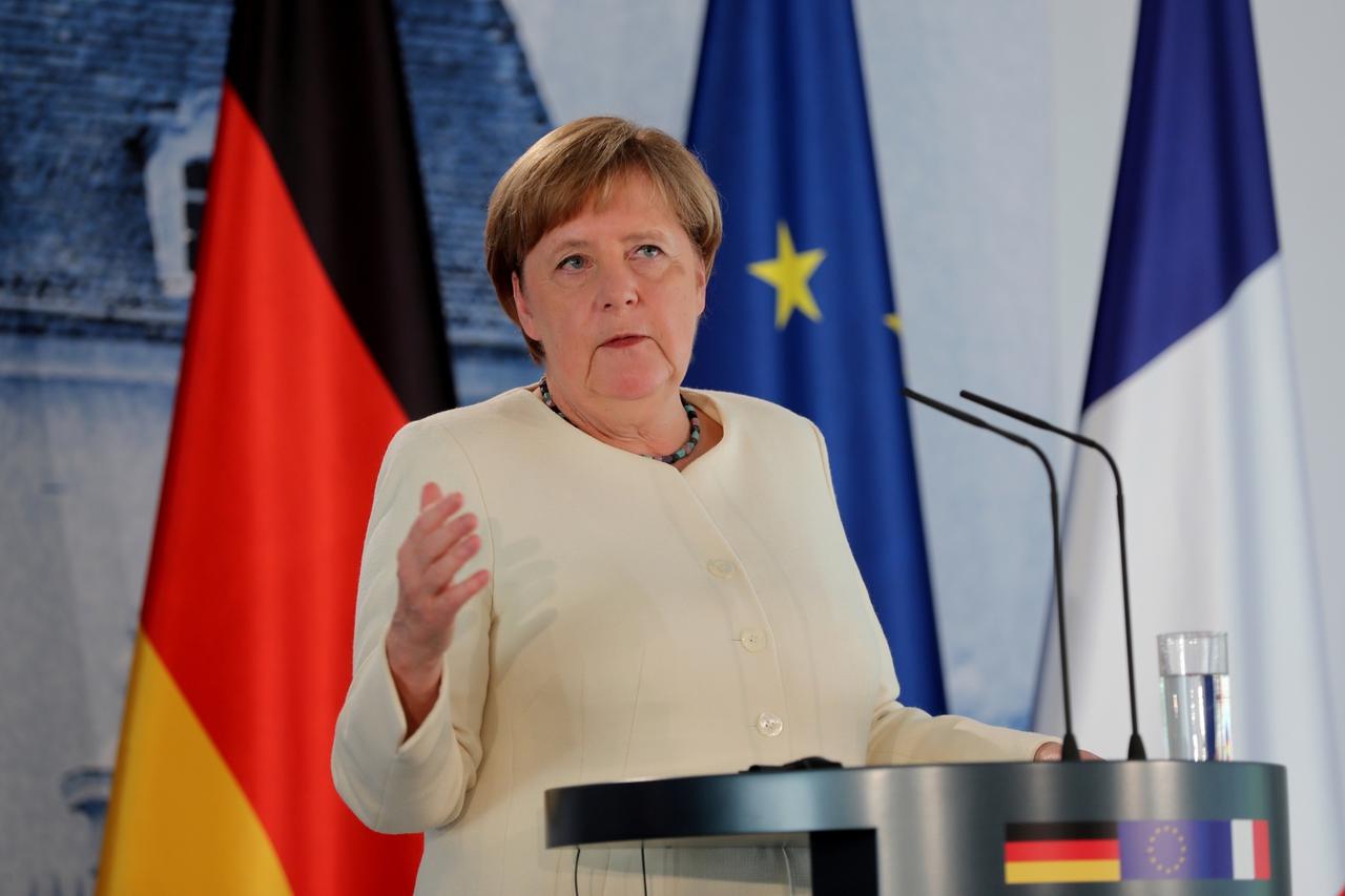 German Chancellor Angela Merkel and French President Emmanuel Macron meet at Meseberg castle