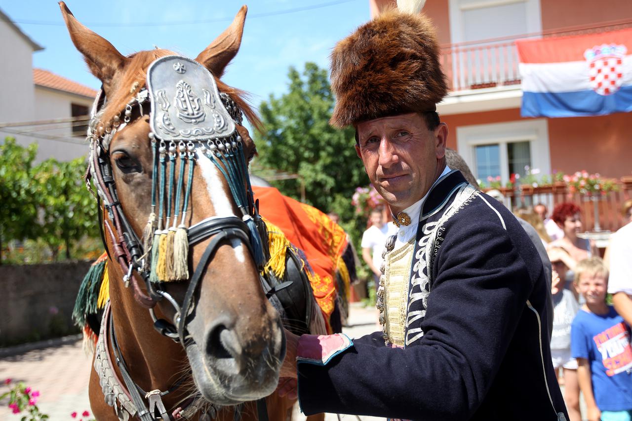 09.08.2015.-  Sinj - Jubilarna 300. Sinjska Alka. Sinjska alka je hrvatska viteska igra. Odrzava se svake godine u nedjelju u prvoj trecini mjeseca kolovoza u Sinju, na godisnjicu pobjede nad turskim osvajacima 14. kolovoza 1715. Photo: Boris Scitar/Vecer