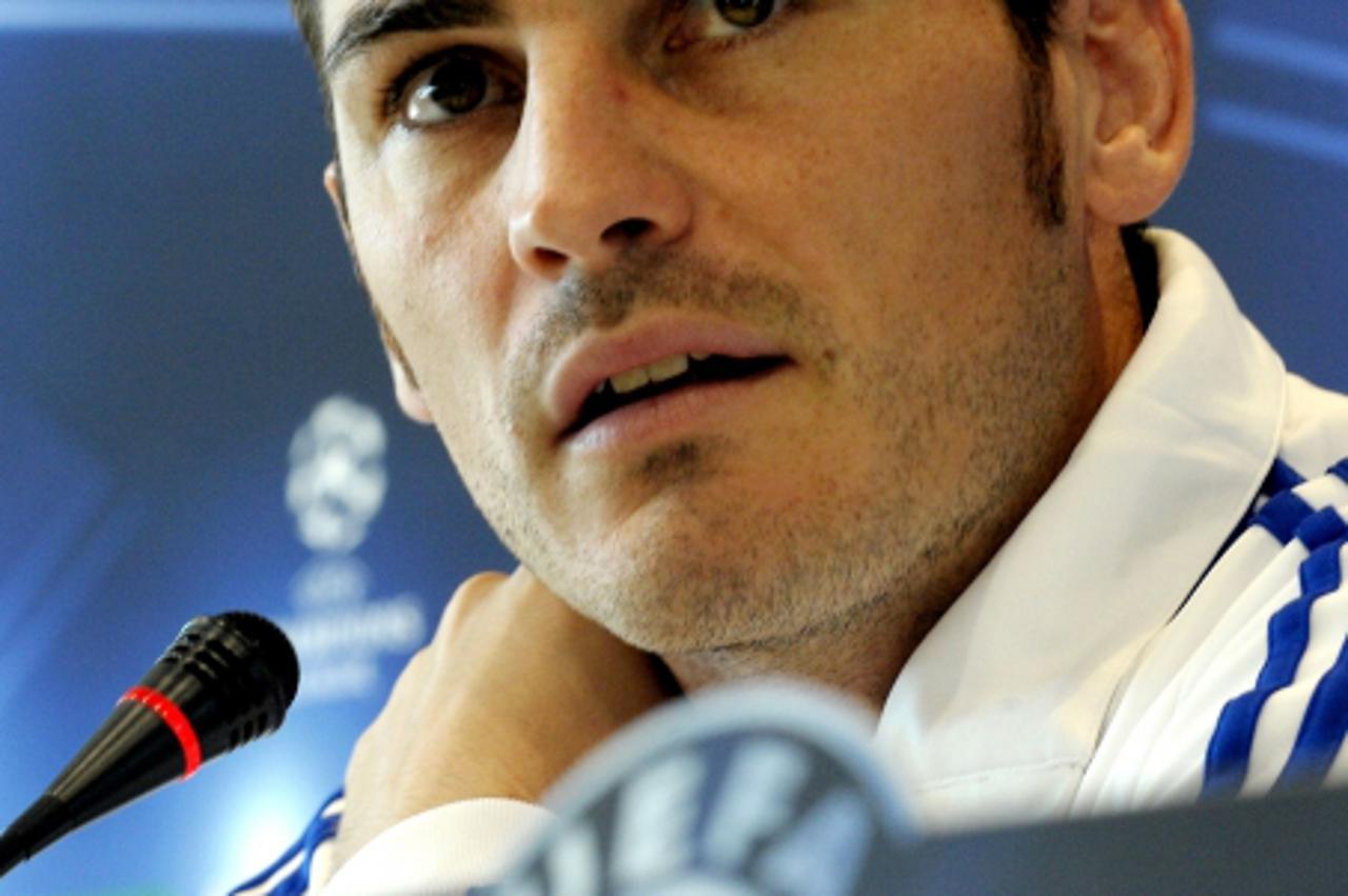 \'Real Madrid\'s goalkeeper and captain Iker Casillas looks on during a press conference before a training session at Real Madrid\'s sport city on October 18, 2010  in Madrid on the eve their Champion