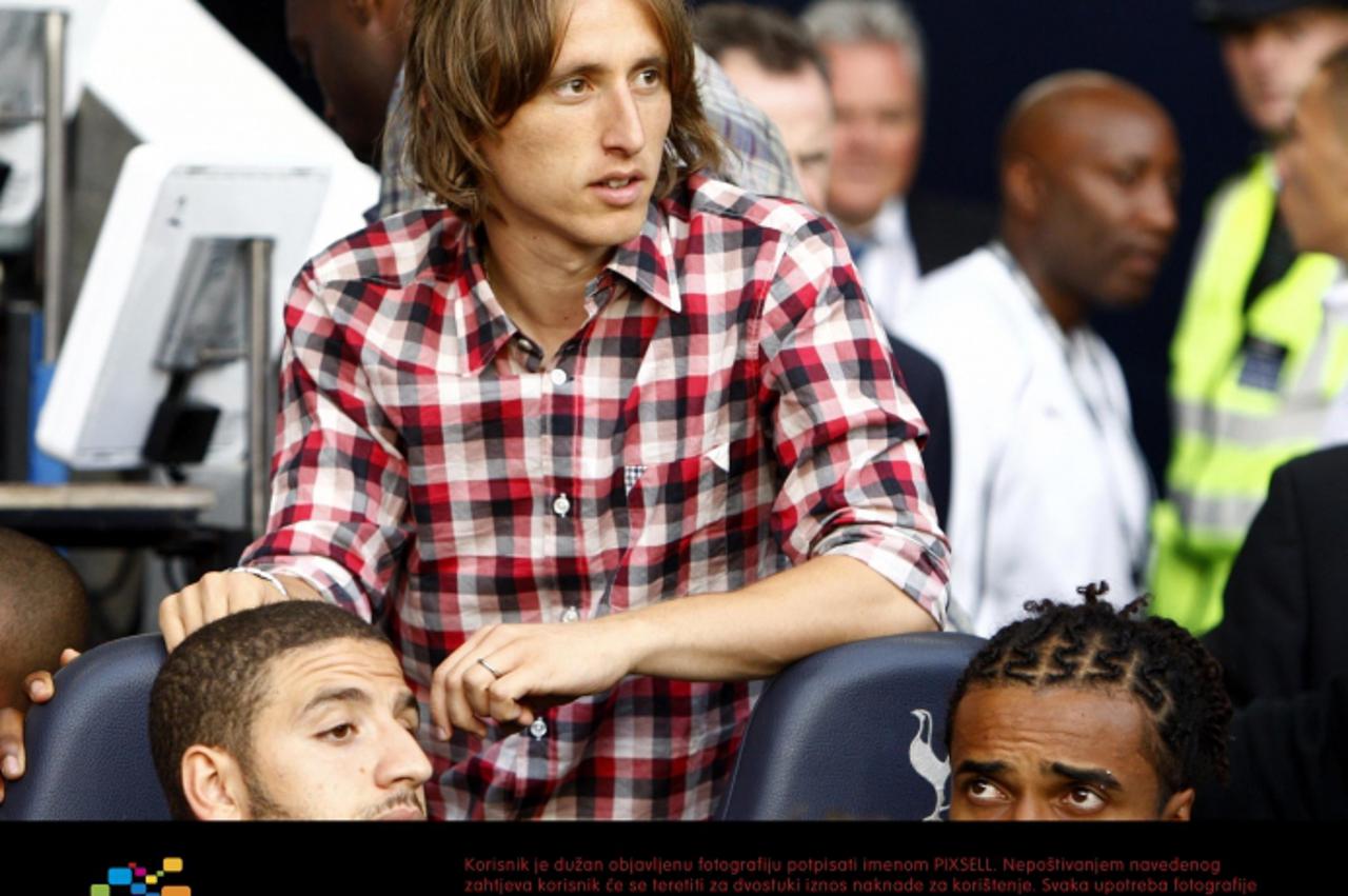 'Tottenham Hotspurs\' Luka Modric watches from the stands during the Pre Season Friendly at White Hart Lane, London. Photo: Press Association/Pixsell'