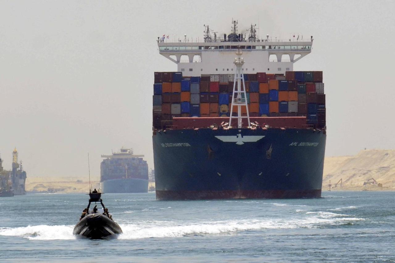 FILE PHOTO: A cargo ship is seen crossing through the New Suez Canal