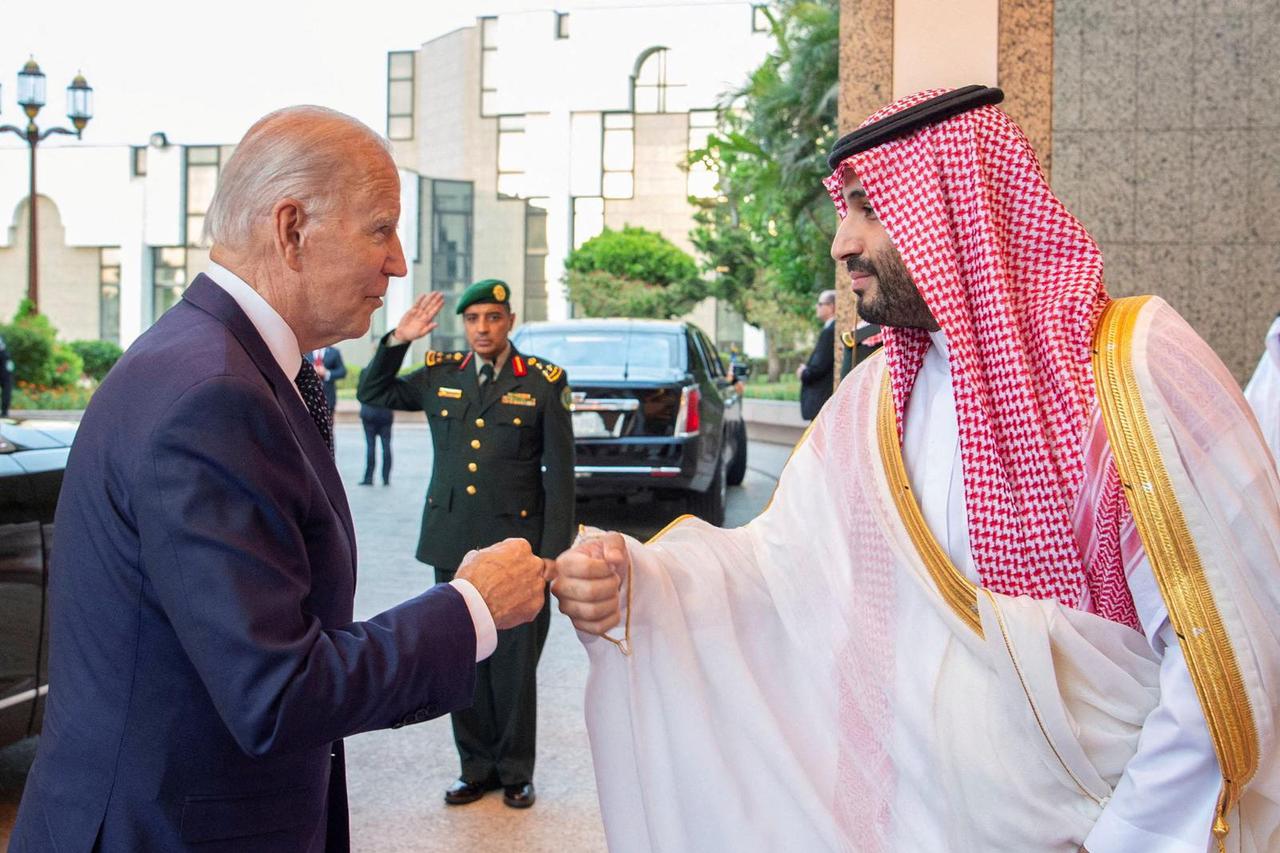 Saudi Crown Prince Mohammed bin Salman fist bumps U.S. President Joe Biden upon his arrival at Al Salman Palace, in Jeddah