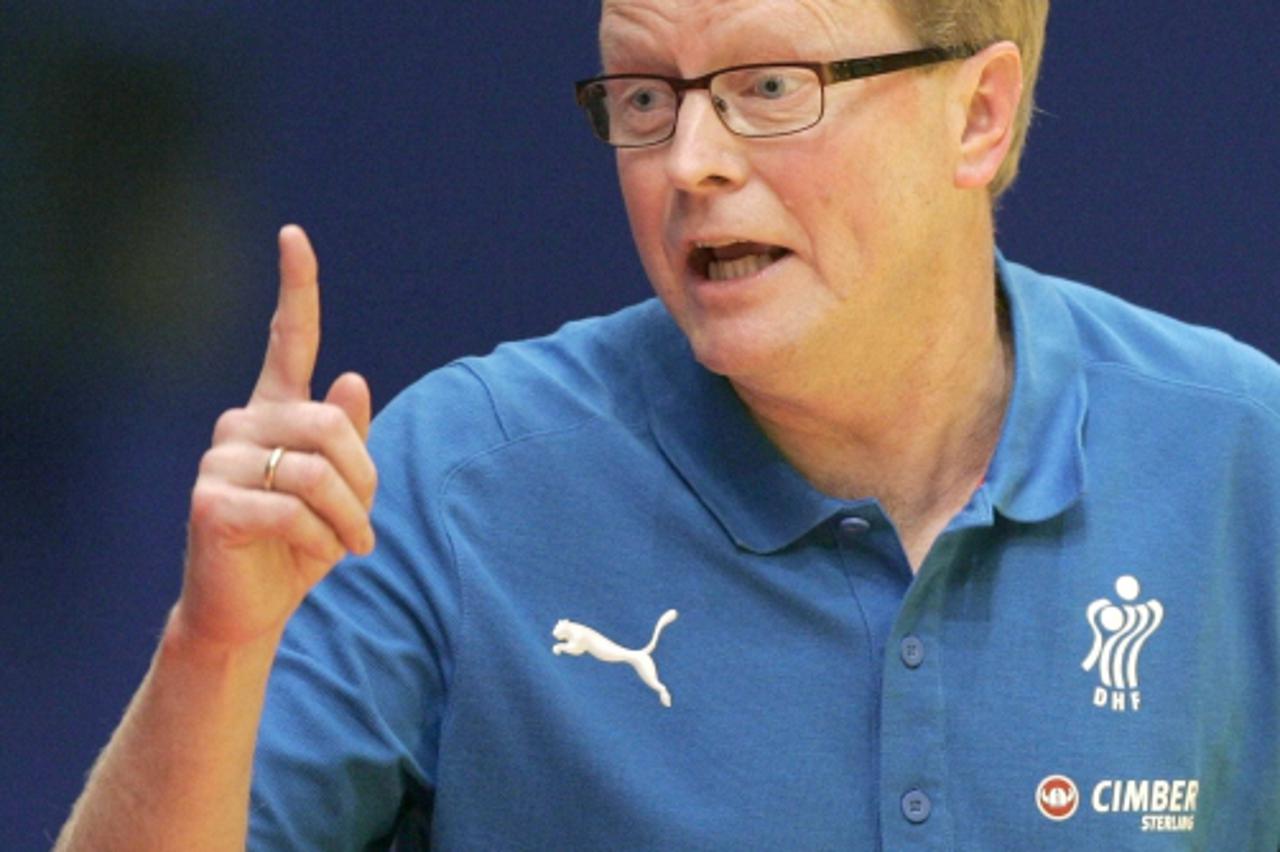 'Denmark\'s head coach Ulrik Wilbek reacts  during their Men\'s European Handball Federation Championship second round match against Russia in Vienna January 25, 2010. REUTERS/Nikola Solic (AUSTRIA - 