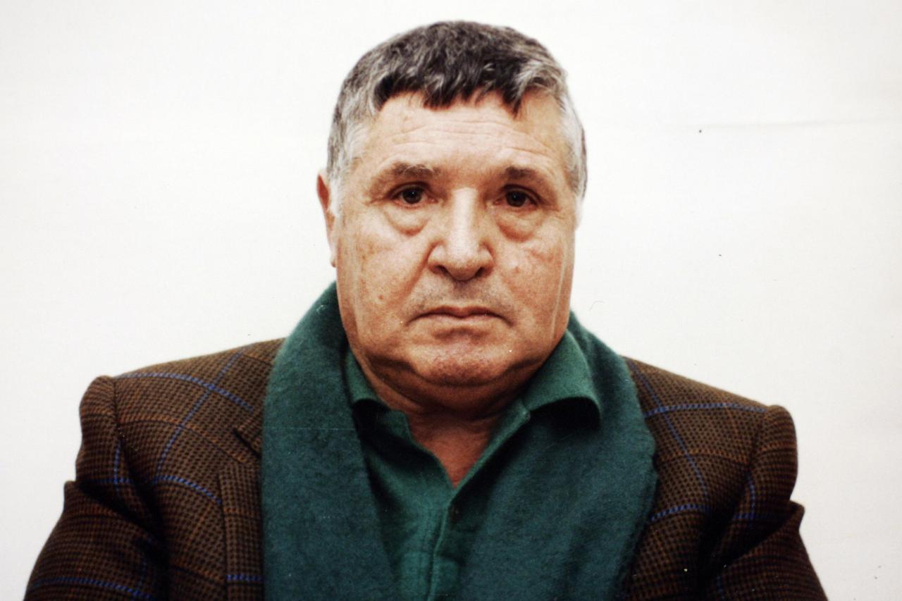 A combination photograph shows a file photo of arrested Sicilian mafia boss Toto Riina (L) and Italian actor Claudio Gioe, who impersonates Riina in the disputed fiction 