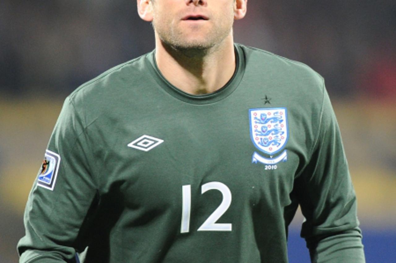 'England\'s goalkeeper Robert Green reacts during the Group C first round 2010 World Cup football match England vs. USA on June 12, 2010 at Royal Bafokeng stadium in Rustenburg. NO PUSH TO MOBILE / MO