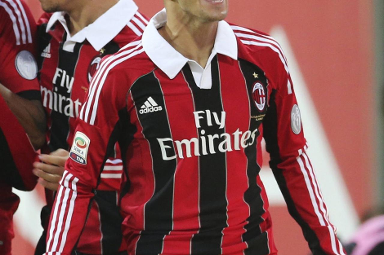 'AC Milan\'s Stephan El Shaarawy celebrates after scoring against Parma during their Serie A soccer match at the Tardini stadium in Parma September 29, 2012.  REUTERS/Giorgio Benvenuti  (ITALY - Tags: