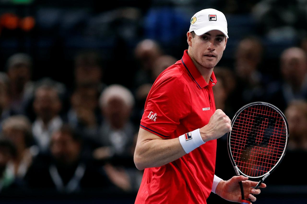 Tennis - Paris Masters tennis tournament men's singles quarterfinals - John Isner of the U.S. v Jack Sock of the U.S. - Paris, France - 4/11/2016 - Isner reacts. REUTERS/Gonzalo Fuentes