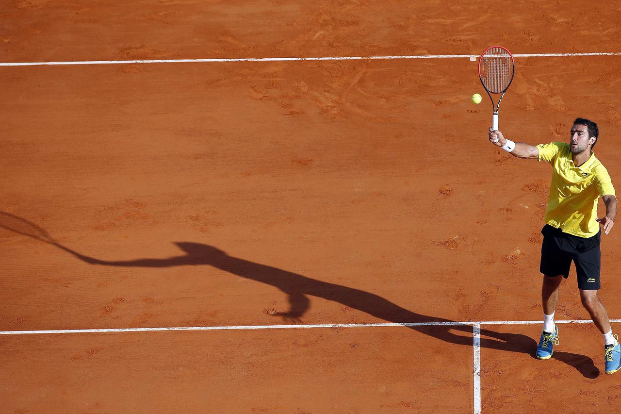 Marin Cilic of Croatia returns the ball during his match against Florian Mayer of Germany at the Monte Carlo Masters in Monaco April 14, 2015.  REUTERS/Eric Gaillard