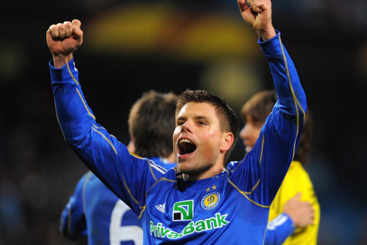 'Dynamo Kiev\'s Croatian midfielder Ognjen Vukojevic celebrates at the final whistle after the UEFA Europa League Round of 16 football match between Manchester City and Dynamo Kiev at The City of Manc