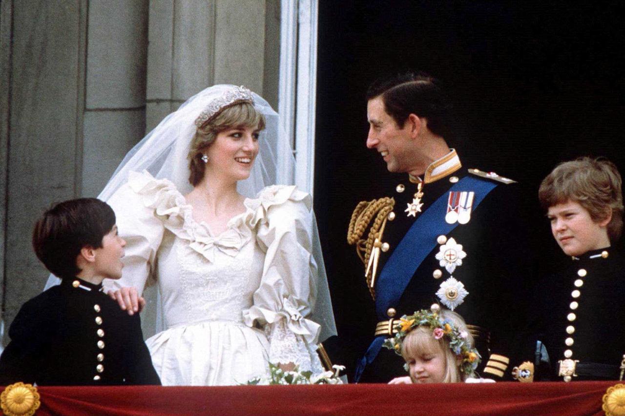 FILE PHOTO: Prince Charles and Princess Diana stand on the balcony of Buckingham Palace following their wedding at St. Paul's Cathedral
