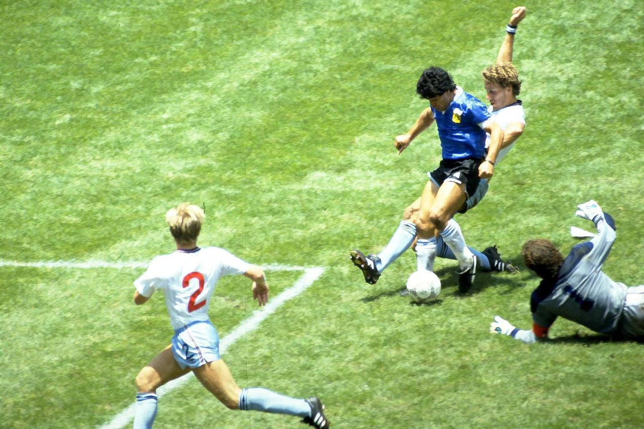 FILE PHOTO: Diego Maradona scores for Argentina