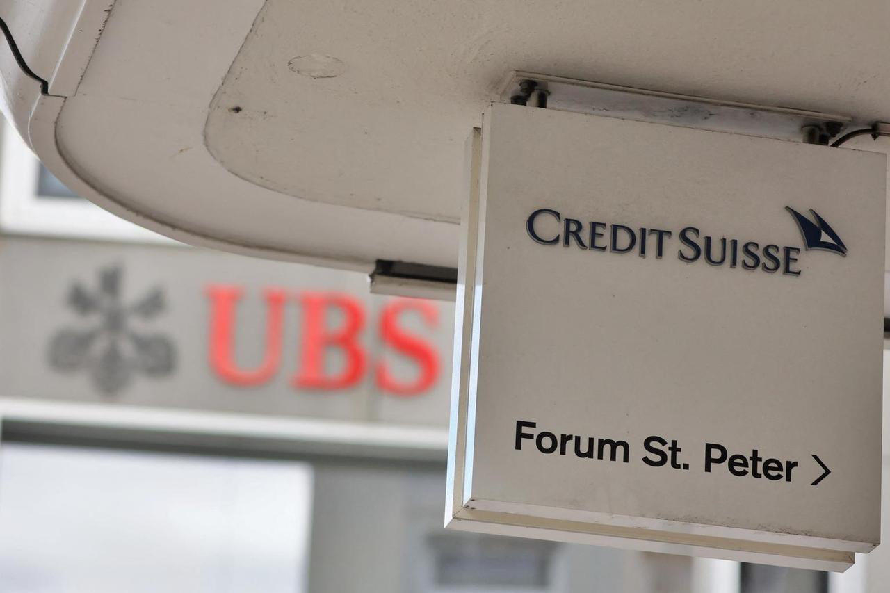 Logos of Swiss bank UBS and Credit Suisse in Zurich