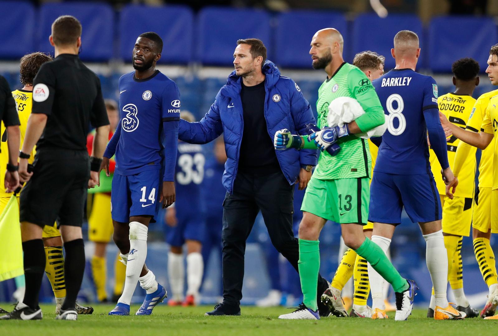 Carabao Cup Third Round - Chelsea v Barnsley Soccer Football - Carabao Cup Third Round - Chelsea v Barnsley - Stamford Bridge, London, Britain - September 23, 2020 Chelsea manager Frank Lampard  with  Fikayo Tomori after the match Pool via REUTERS/Alastair Grant EDITORIAL USE ONLY. No use with unauthorized audio, video, data, fixture lists, club/league logos or 'live' services. Online in-match use limited to 75 images, no video emulation. No use in betting, games or single club/league/player publications.  Please contact your account representative for further details. ALASTAIR GRANT