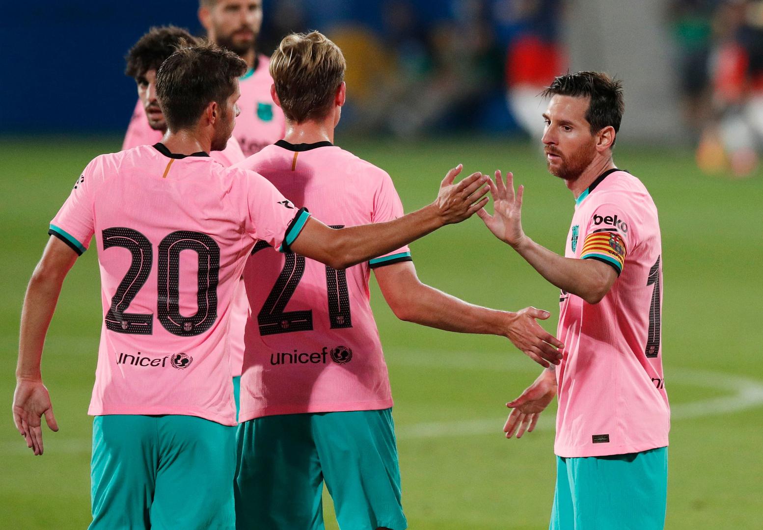 Pre Season Friendly - FC Barcelona v Girona Soccer Football - Pre Season Friendly - FC Barcelona v Girona - Johan Cruyff Stadium, Barcelona, Spain - September 16, 2020 Barcelona's Lionel Messi celebrates scoring their third goal with teammates REUTERS/Albert Gea ALBERT GEA