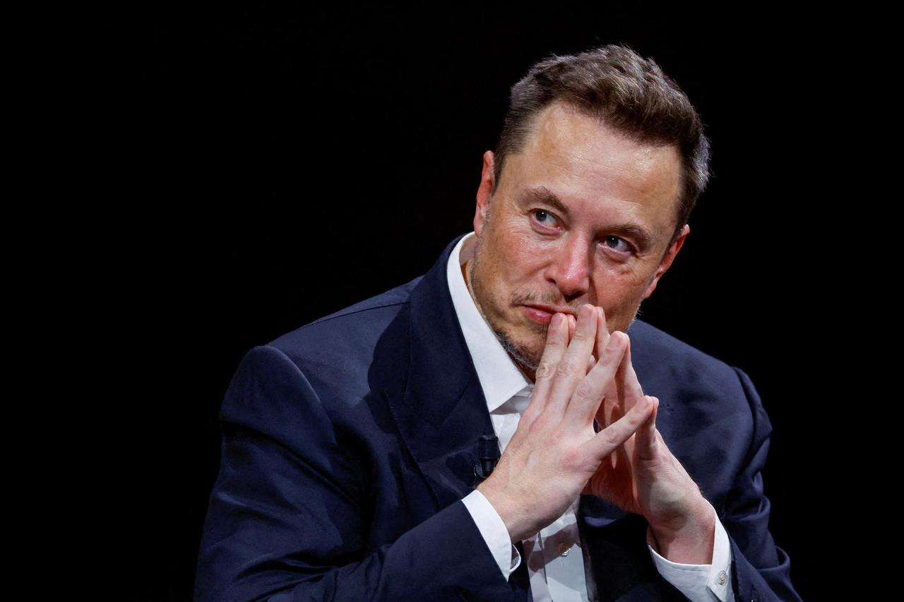 Elon Musk is seen at a conference in France