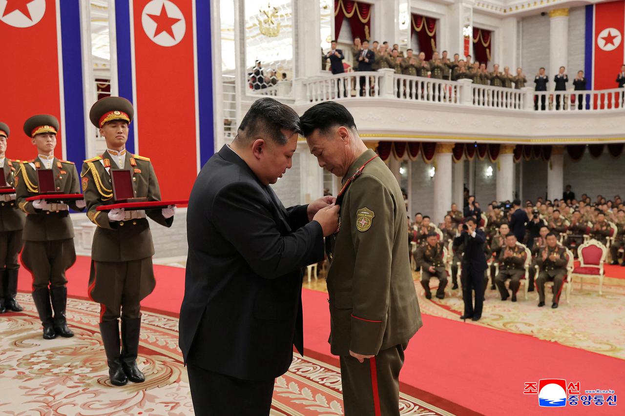 North Korean leader Kim Jong attends a national commendation ceremony at the headquarters of the Central Committee of the Korean Workers' Party,  in Pyongyang