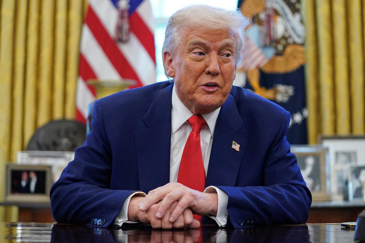 FILE PHOTO: U.S. President Donald Trump signs executive orders at the White House