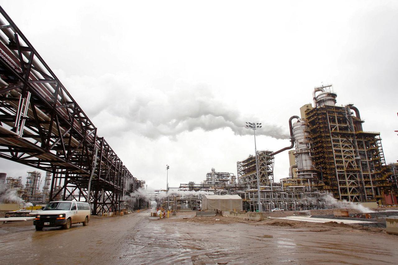 FILE PHOTO: A truck drives down a street at Syncrude's oil sands operation near Alberta