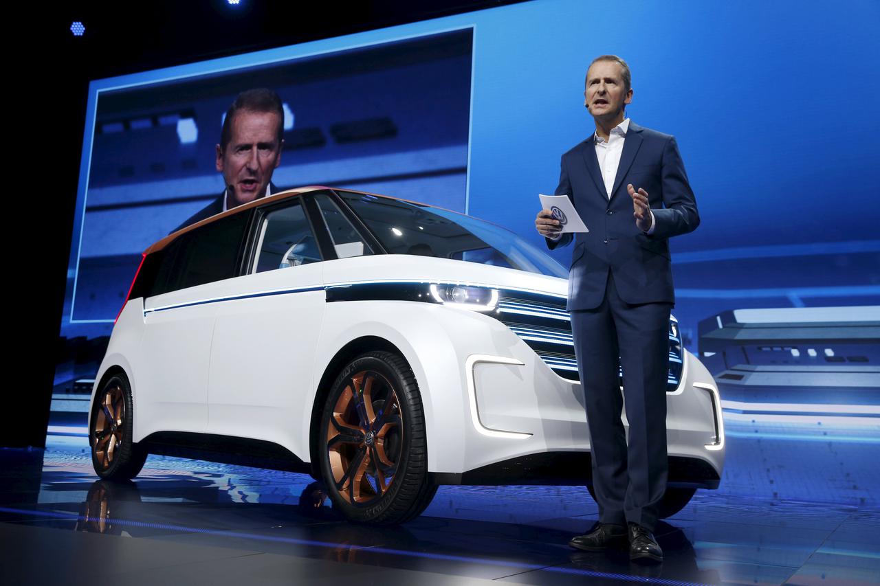 Herbert Diess, chairman of Volkswagen Passenger Cars' board, speaks in front of the Volkswagen BUDD-e electric vehicle during a keynote address at the 2016 CES trade show in Las Vegas, Nevada, January 5, 2016.  REUTERS/Steve Marcus