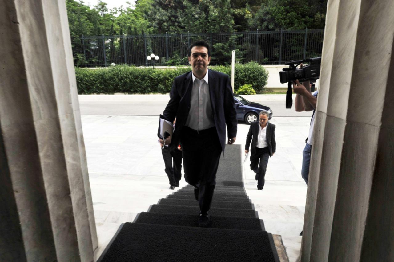 \'The Greek leader of the Radical Left (Syriza) coalition, Alexis Tsipras, arrives at parliament in Athens on May 8, 2012 after the Greek president gave him a mandate to form a government. The country