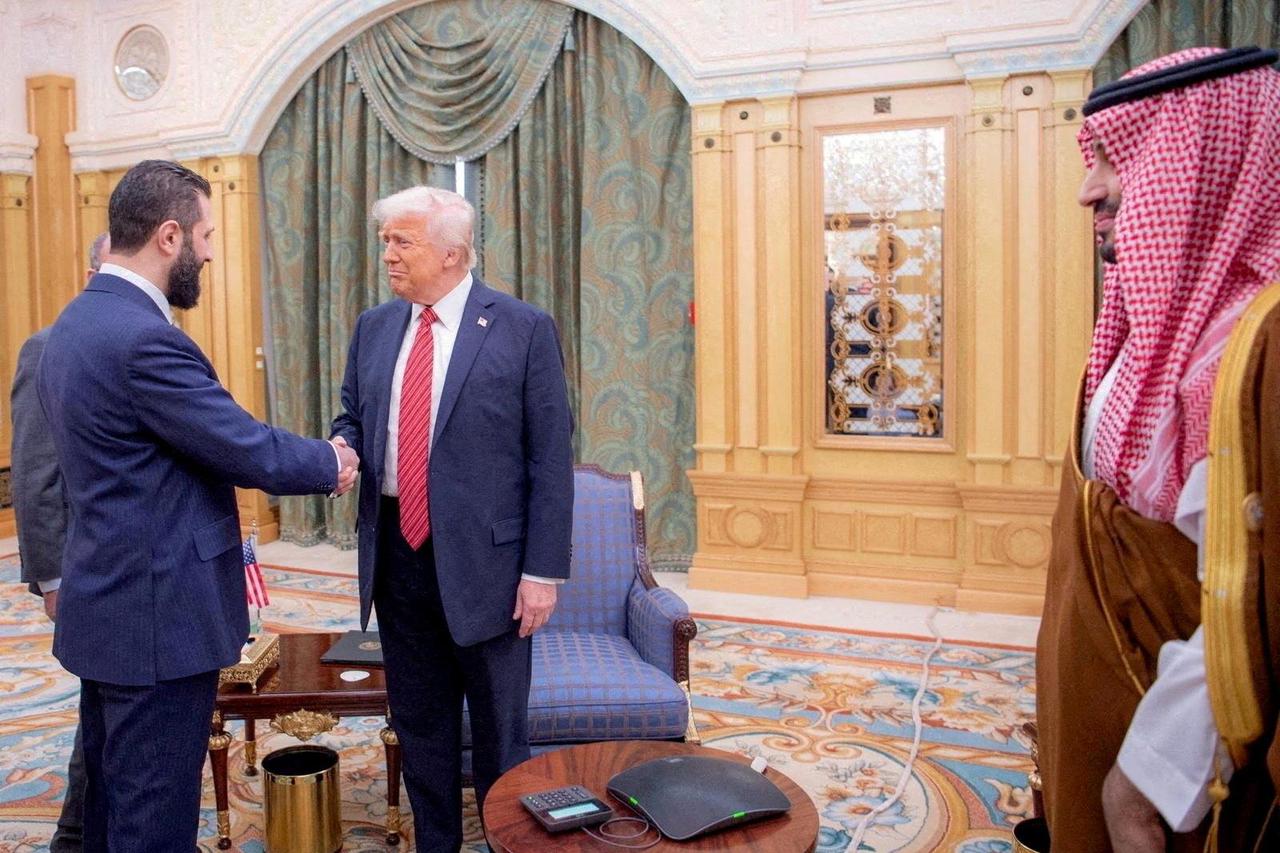 FILE PHOTO: U.S. President Donald Trump meets Syrian President Ahmed al-Sharaa in Riyadh