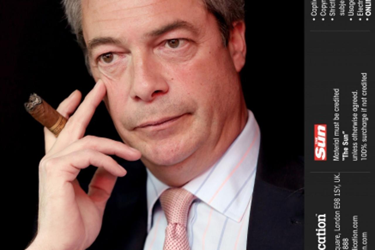 'UKIP leader Nigel Farage at the Boisdale of Belgravia pub in London, SW1. Credit: The Sun Online rights must be cleared by N.I.SyndicationPhoto: NI Syndication/PIXSELL'