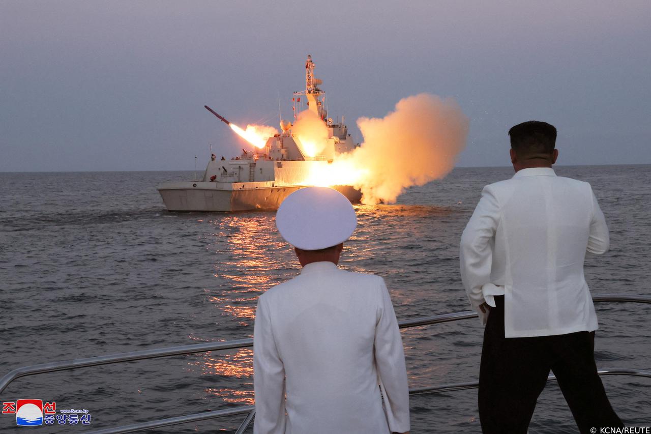 North Korean leader Kim Jong Un oversees a strategic cruise missile test aboard a navy warship