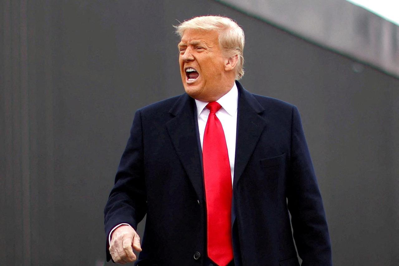 FILE PHOTO: U.S. President Donald Trump visits the U.S.-Mexico border wall, in Alamo, Texas