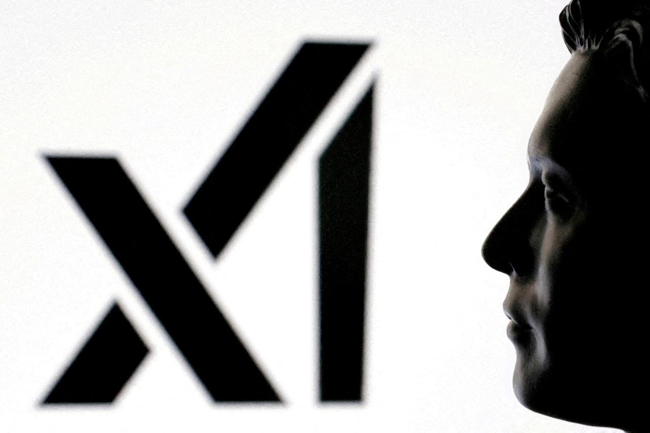FILE PHOTO: Illustration shows 3D-printed miniature model of Elon Musk and xAI logo