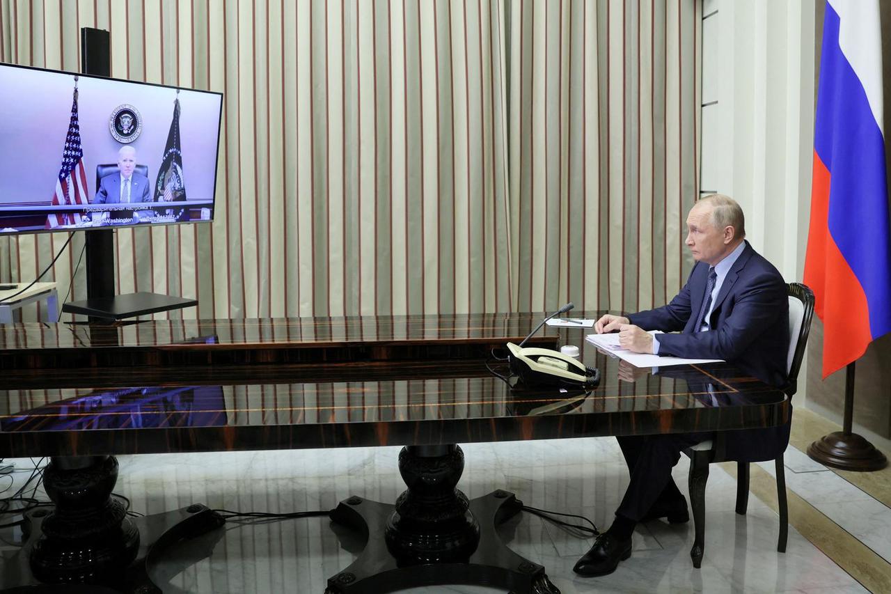 FILE PHOTO: Russian President Vladimir Putin holds talks with U.S. President Joe Biden via a video link in Sochi
