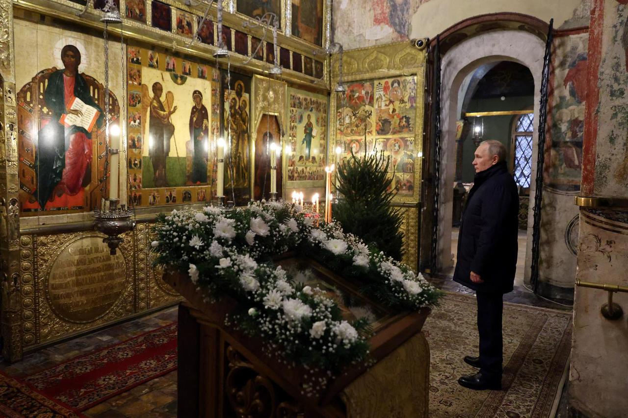 Russian President Vladimir Putin attends the Orthodox Christmas service in Moscow