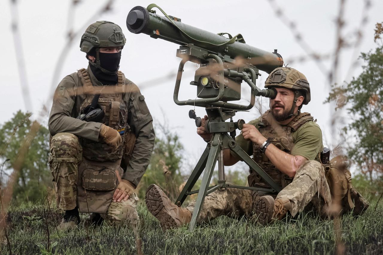 Ukrainian servicemen attend a training between combat missions at a training ground in Kharkiv region