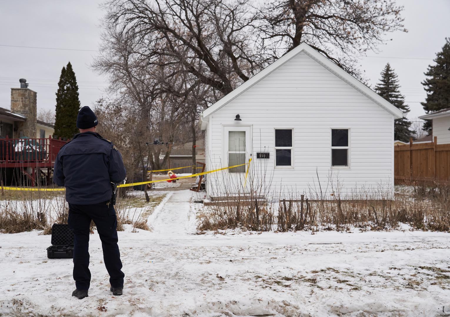 RCMP fly a drone at the scene of an ongoing investigation regarding five deaths in southern Manitoba, in Carman, Man., Monday, Feb. 12, 2024. THE CANADIAN PRESS/David Lipnowski