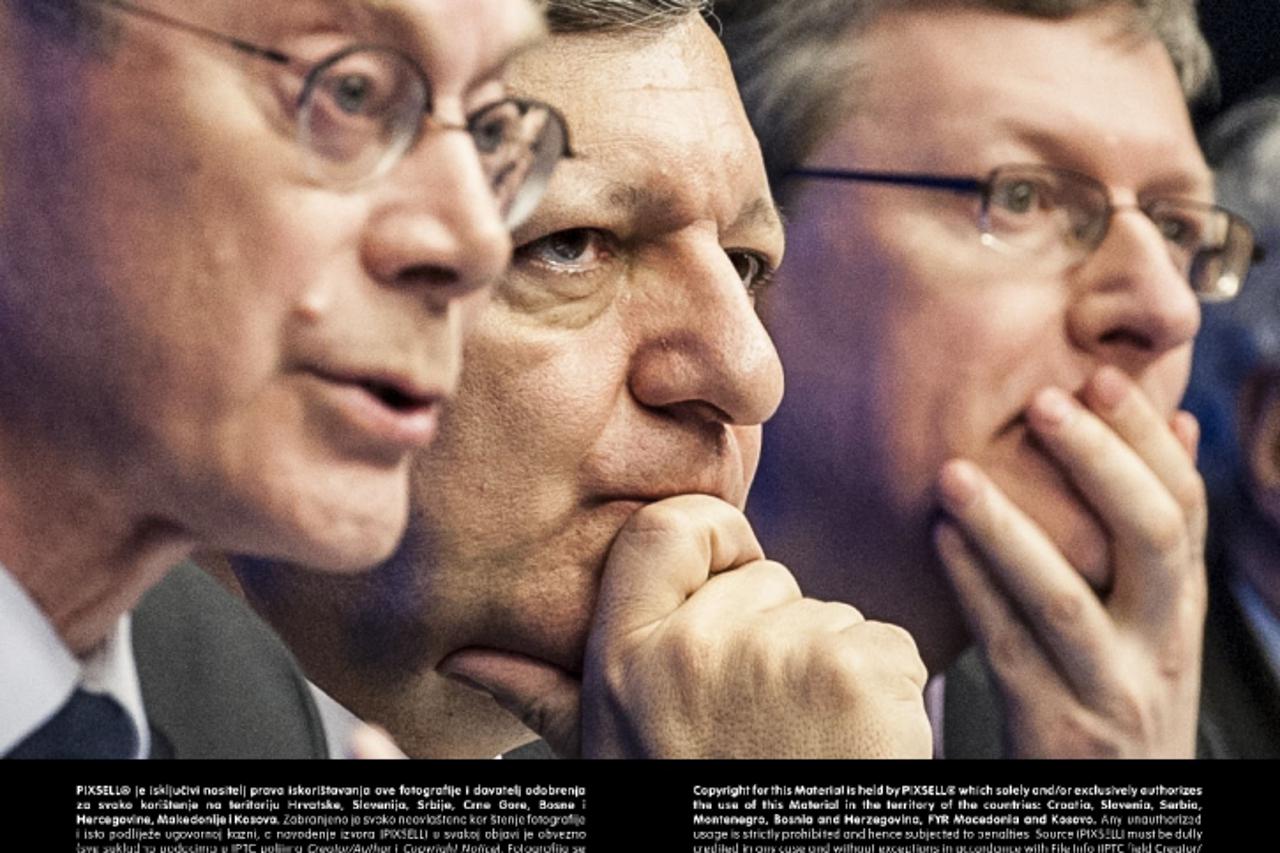 'European Union president Herman Van Rompuy (L),  European Commission President Jose Manuel Barroso (C) and László Andor is the Member of the European Commission responsible for employment, social aff