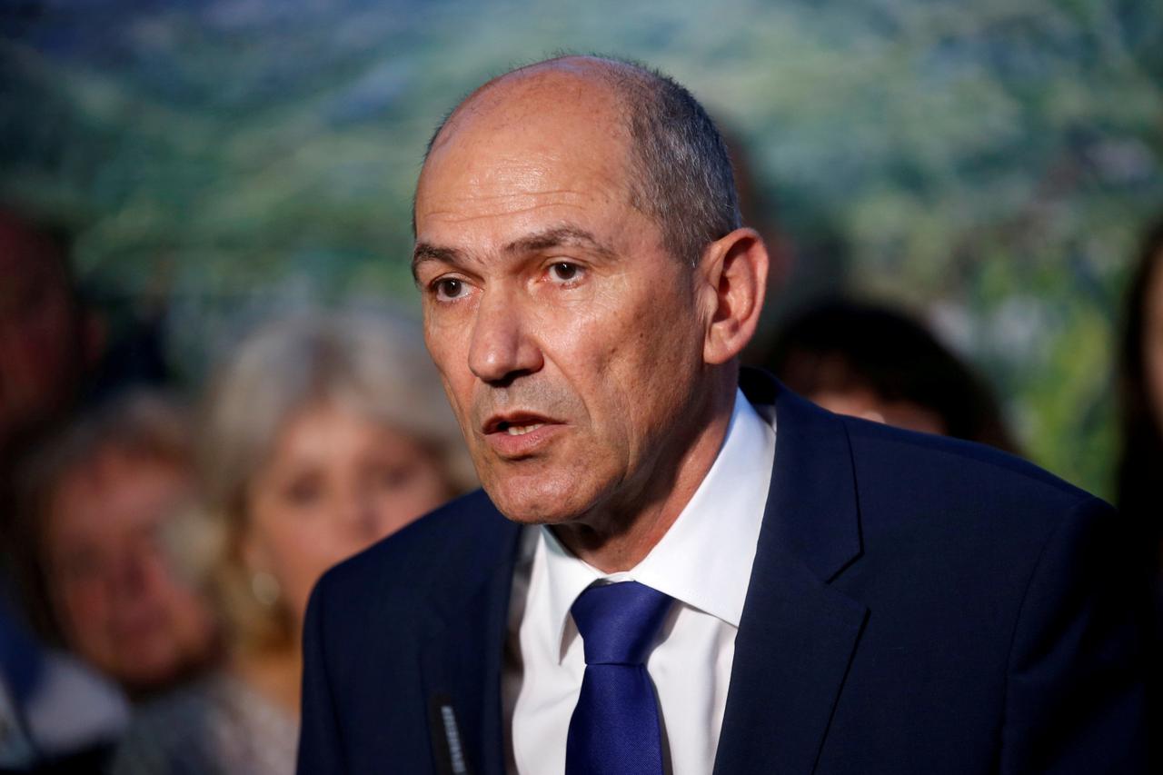 FILE PHOTO: Janez Jansa, leader of the Slovenian Democratic Party (SDS), speaks to the media and supporters after the general election in Ljubljana