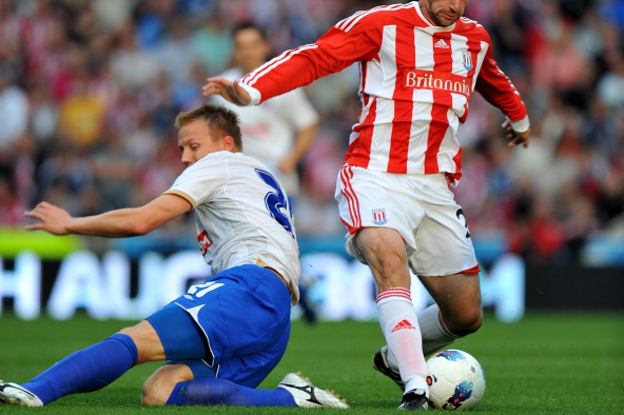 'Stoke City\'s Rory Delap (right) comes away from Hajduk  Split\'s Mario Brkljaca Photo: Press Association/Pixsell'