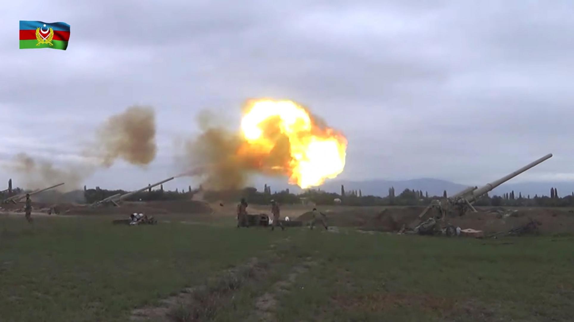 A still image shows members of Azeri armed forces firing artillery in an unidentified location A still image from a video released by the Azerbaijan's Defence Ministry shows members of Azeri armed forces firing artillery during clashes between Armenia and Azerbaijan over the territory of Nagorno-Karabakh in an unidentified location, in this still image from footage released September 28, 2020. Defence Ministry of Azerbaijan/Handout via REUTERS  ATTENTION EDITORS - THIS IMAGE HAS BEEN SUPPLIED BY A THIRD PARTY. NO RESALES. NO ARCHIVES. MANDATORY CREDIT. DEFENCE MINISTRY OF AZERBAIJAN