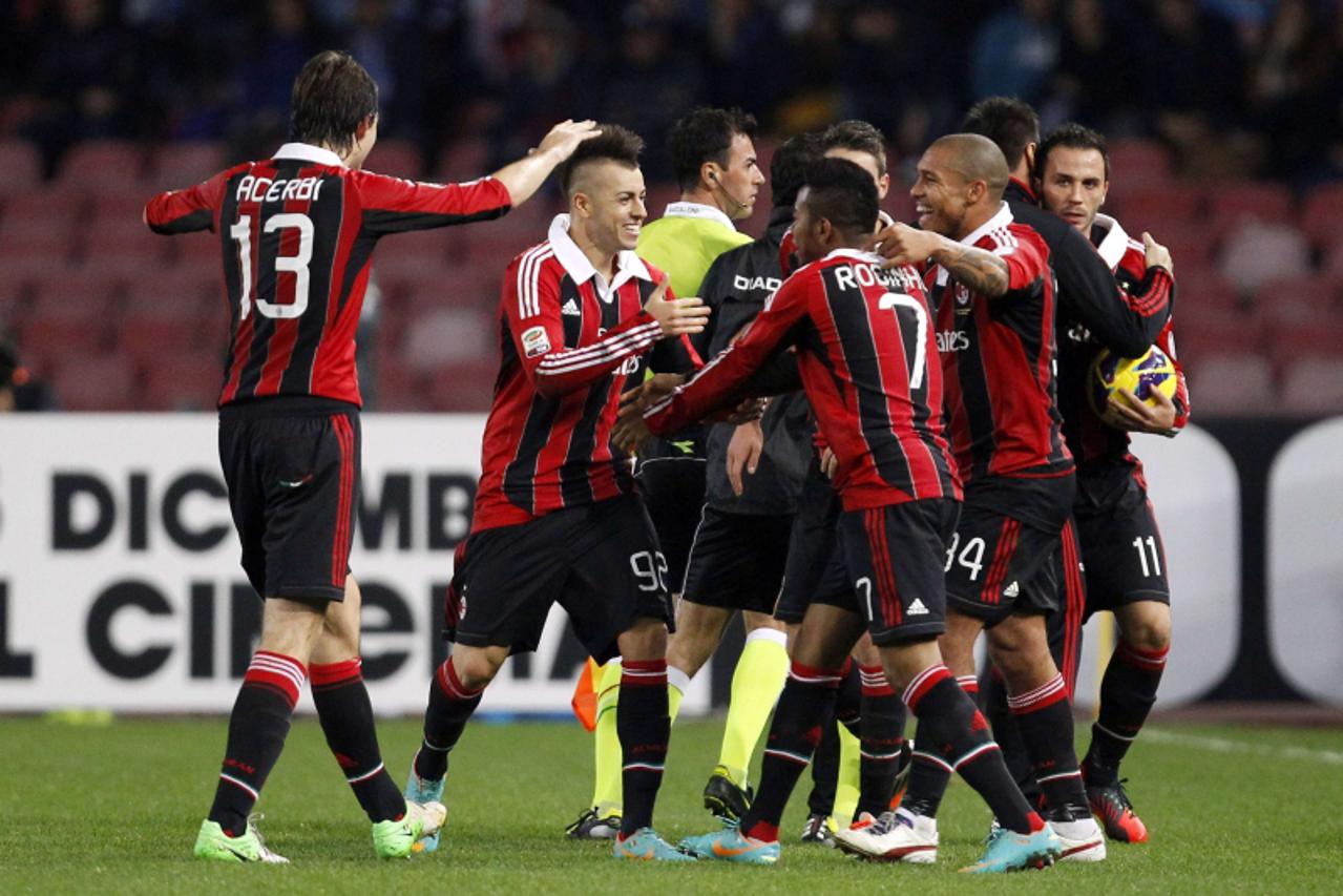 'AC Milan\'s Stephan El Shaarawy (2nd L) celebrates with his teammates after scoring his second against Napoli during their Italian Serie A soccer match at the San Paolo stadium in Naples November 17,
