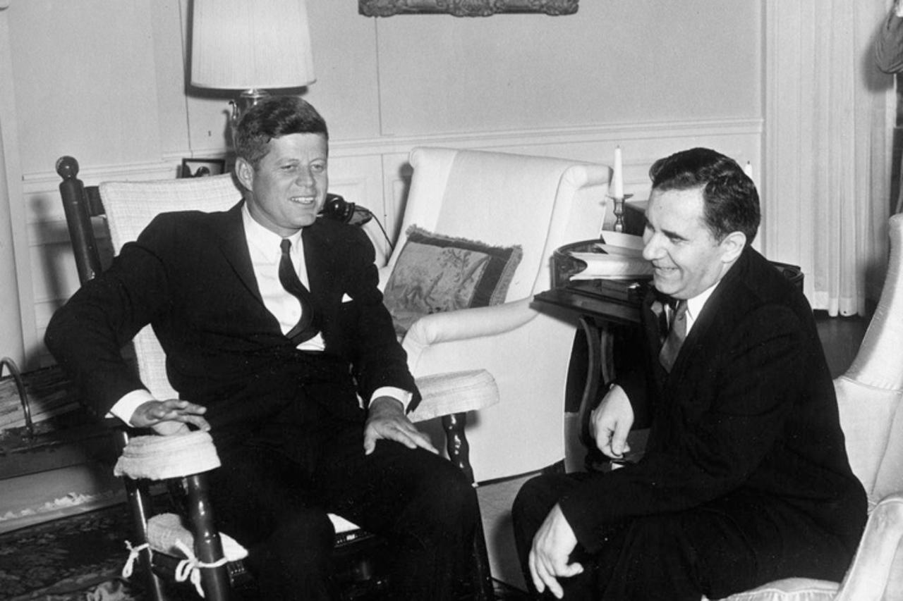 'Then U.S. President John F. Kennedy, seated in fabric-covered rocking chair, meets with Andrei Gromyko, then Minister of Foreign Affairs of the Soviet Union, in the Yellow Oval Room at the White Hous