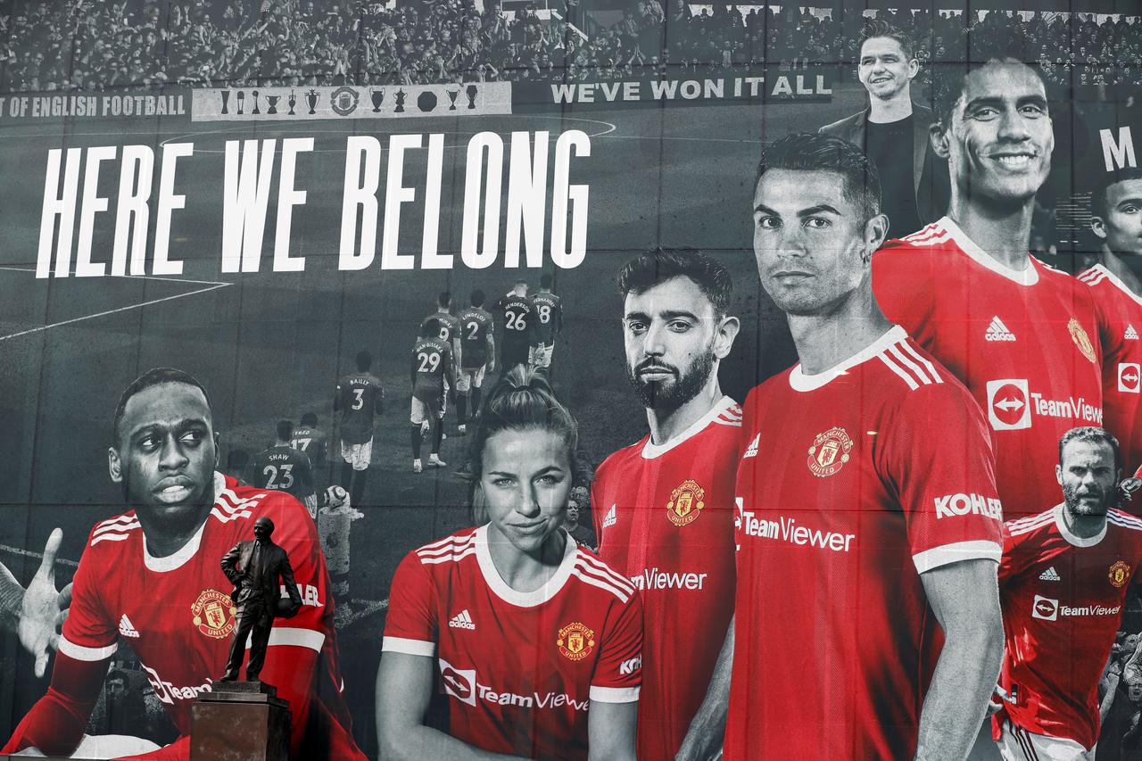 FILE PHOTO: A picture of Cristiano Ronaldo with teammates is displayed on the outside of Old Trafford
